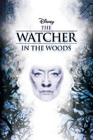 “The Watcher in the Woods” poster—an ethereal woman’s pale face emerging from frosty trees, title set in icy blue.