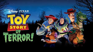 “Toy Story of Terror!” banner—Woody, Buzz, Jessie, Rex, and friends pose against a dark tree line, the title logo bold on the left.